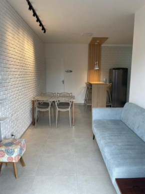 Apartamento praia da enseada 300 metros da praia